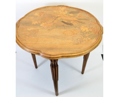 Emile Galle, an Art Nouveau marquetry occasional table, circa 1900, the ogee circular walnut top inlaid with jay flying throu