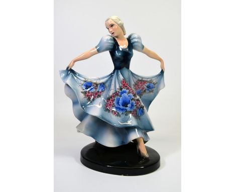 A Goldscheider glazed figure of a female dancer designed by Claire Herczeg. Model 8134. Impressed and printed marks. Circa 19