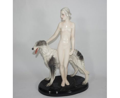A large Goldscheider figure of a nude woman with Borzoi designed by Josef Lorenzl. Model 7463.Impressed and printed marks. he
