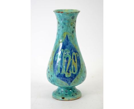 Liza Wilkins for Della Robbia, an art pottery altar vase, 1901, footed baluster form, turquoise glazed with religious monogra