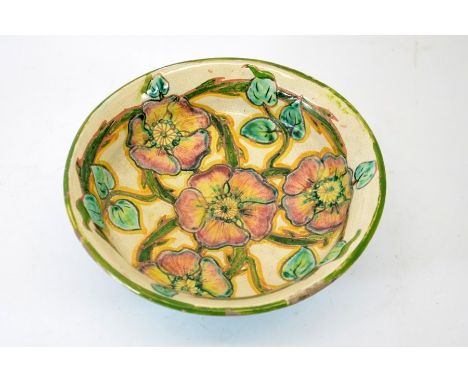 Charles Collis for Della Robbia, an art pottery tazza or pedestal bowl, ogee section sgraffito decorated with roses to the ce