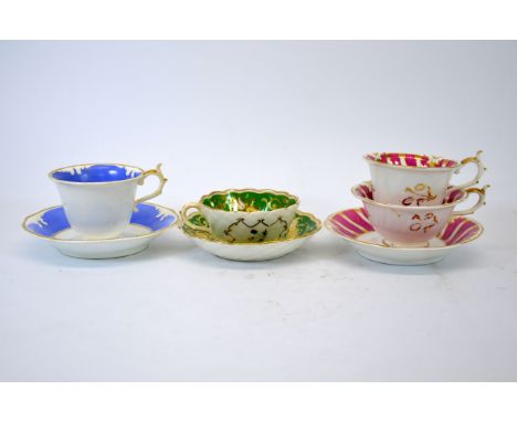 Rockingham tea cups and saucers including patterns 645, 2 75 and 1322, relief moulded rattan and foliate decoration, puce mar