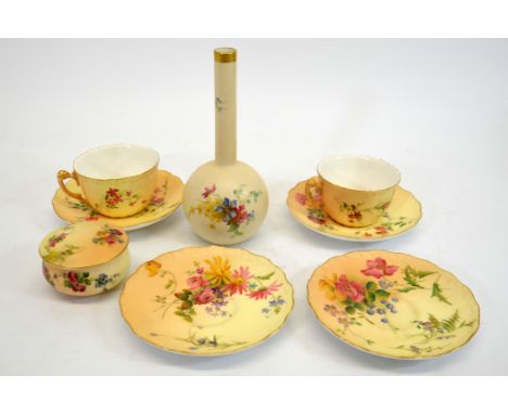 A selection of Royal Worcester blush ivory including saucers, cups lidded pot and a shaft vase (8)