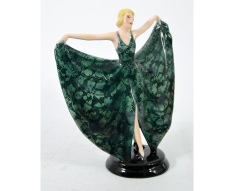 Josef Lorenzl and Stephan Dakon for Goldscheider, a figure of a dancer, circa 1934, model 6942, wearing a green foliate dress