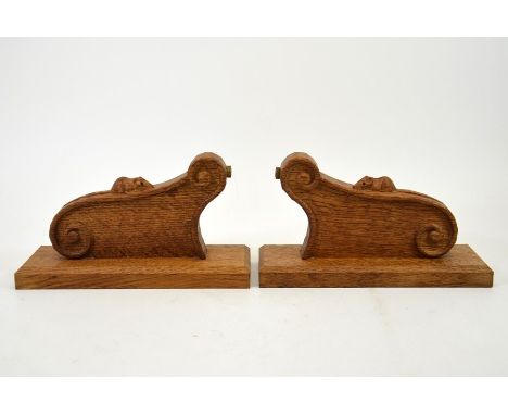 Robert Thompson of Kilburn, pair of Mouseman oak twin wall lights, semi-circular design with carved mouse signature, 23cm hig