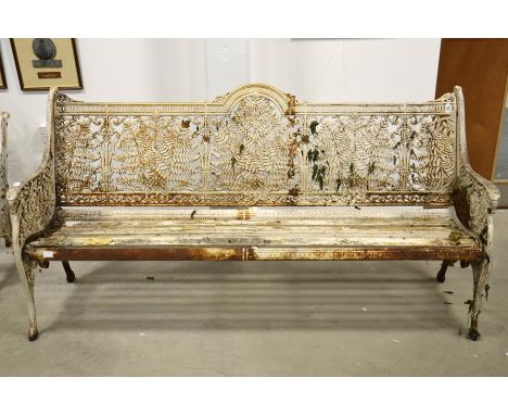 A Victorian cast iron three seat garden bench, attributed to Coalbrookdale, fern and lily of the valley design, number 273254