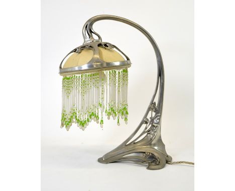 WMF, a Jugendstil silver plated table lamp, open tendril design with Art Nouveau style ivy and berries, circa 1905, supportin