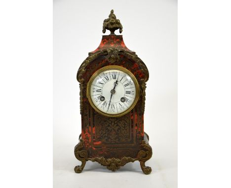 A 19th century Boulle work clock, the 3.5 inch white enamelled dial within a tortoiseshell and chased inlaid brass case, with