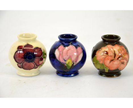 Walter Moorcroft, a group of three miniature vase's, ovoid form, circa 1970, printed marks, height 5cm, (3)