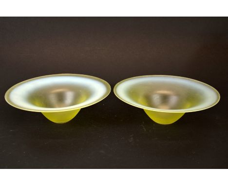 A pair of Arts and Crafts straw opal glass light shades, shallow dish form, satin finish, 2.8cm fixing, 19cm diameter (2)
