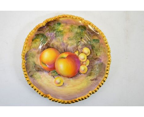 A Royal Worcester fruit painted plate, signed indistinctly, apples and grapes, 15cm diameter