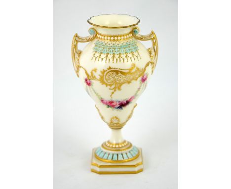 George Owen for Royal Worcester, a reticulated pedestal vase, 1898, double ogee form with twin handles, pierced and gilt jewe