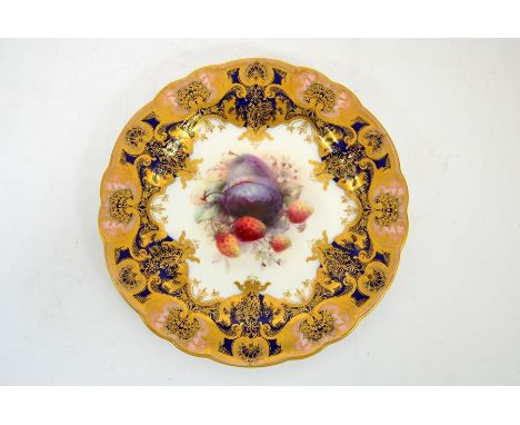 A Royal Worcester fruit painted cabinet plate, 1912, signed by Cole, plums and strawberries, within a gilt shell foliate bord