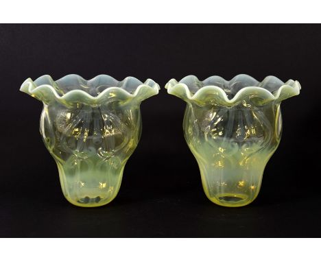 John Walsh Walsh, a pair of Arts and Crafts glass light shades, ogee form, straw opal optic moulded foliate design, crimped r