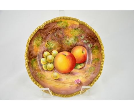 A Royal Worcester fruit painted plate, signed C Smith, apples and grapes, 15cm diameter