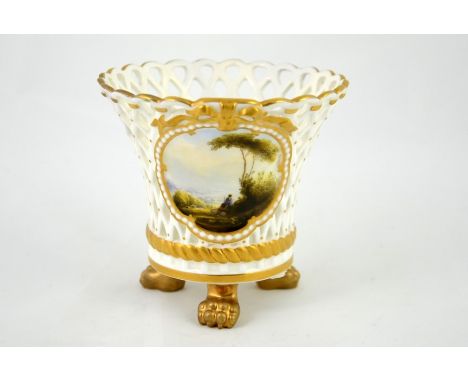 Harry Davis for Royal Worcester, a scene painted reticulated basket, 1912, flared form on three lions paw feet, the central p