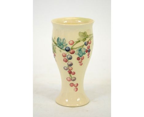 William Moorcroft for Liberty and Co, grape design vase with lustre glaze, circa 1907, signed, printed marks, height 12.5cm.