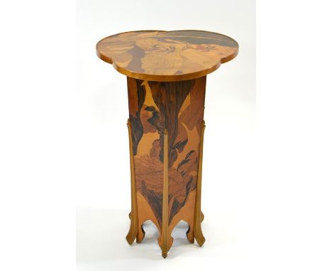 Emile Galle, an Art Nouveau marquetry pedestal occasional table, circa 1900, the trefoil top inlaid with irises in specimen w