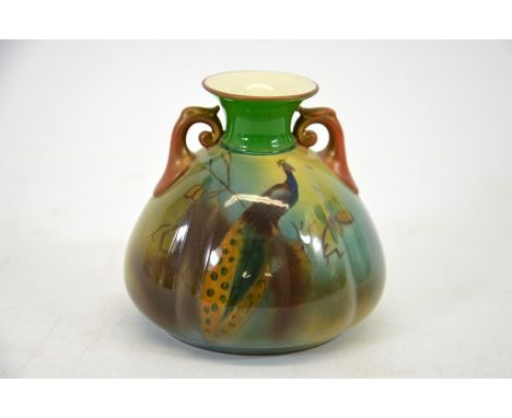 A Royal Worcester Hadley peacock vase, 1910, squat lobed onion form with twin handles, green mark, 9cm high