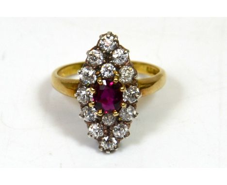 Ruby and diamond cluster ring, oval ruby (approx 5.8 x 4.9mm) surrounded by fourteen brilliant cut diamonds in a marquese sha