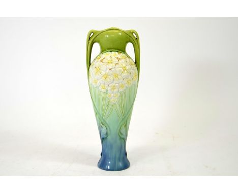 A Zsolnay Art Nouveau art pottery vase, relief moulded flowers and sinuous tendrils on a twin handled inverse baluster body, 