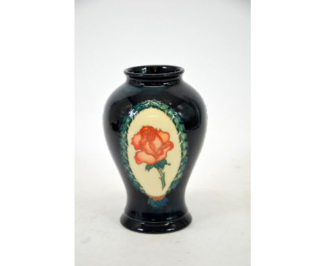 A Moorcroft Collectors Club 1994 vase, with orange rose in wreaths decoration, blue ground, signed, impressed marks, height 1