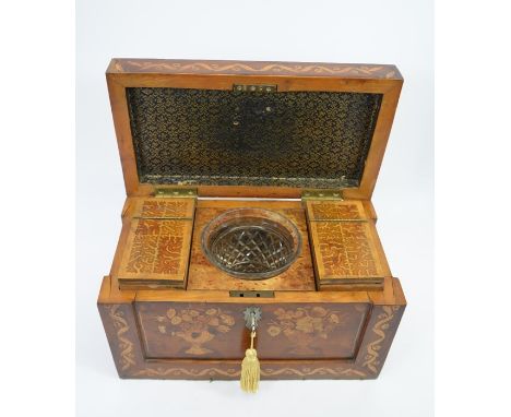 A 19th century Killarney tea caddy, circa 1850, inlaid with marquetry floral vases and coral and parquetry lid, bordered in l