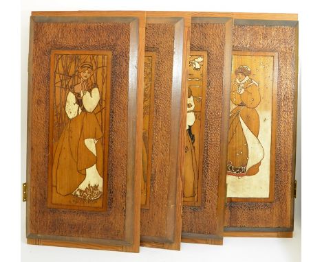 A set of four Arts and Crafts wooden panels, each incised with an allegorical figure of the seasons, circa 1890, in the style