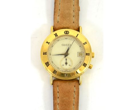 Ladies Gucci watch, vintage Gucci quartz movement watch, Gold plated case with subsidiary seconds dial to six o'clock, date a