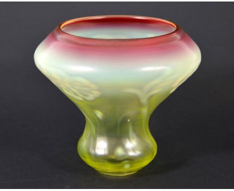 An Arts and Crafts glass light shade, double gourd form, straw opal vaseline with cranberry tinted rim, optic moulded with fl