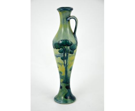 William Moorcroft for Liberty and Co, a Hazeldene ewer, slender baluster form, circa 1910, signed, printed marks, 18cm high