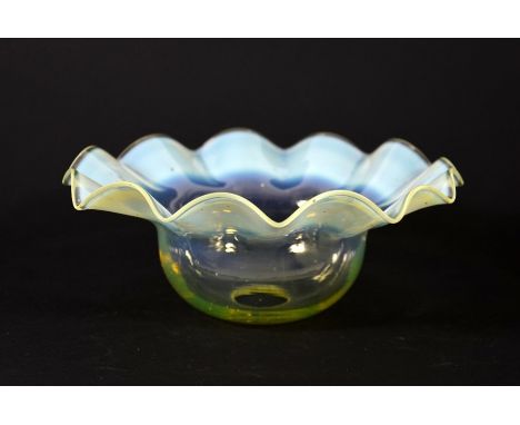 James Powell and Sons, Whitefriars, an Arts and Crafts glass light shade, straw opal domed and flared form with crimped rim, 