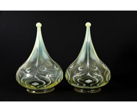 John Walsh Walsh, a pair of Arts and Crafts opalescent glass light shades, circa 1901, of onion teardrop form, straw opal opt