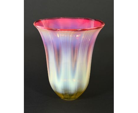 An Arts and Crafts cranberry tinted straw opal glass light shade, optic moulded vertical ribbed banding, 14cm high, 3cm fixin