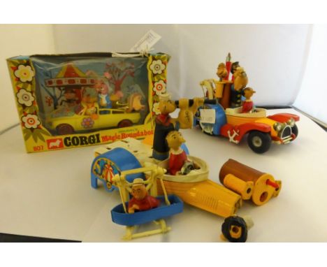 A boxed Corgi Comics 807 Dougal's Magic Roundabout car, together with an unboxed 802 Popeye Paddle Wagonand a further Popeye 