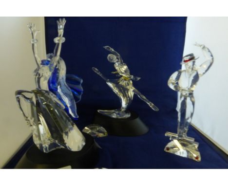 Boxed Swarovski "Magic of Dance" series Antonio, Isadora and Anna figurines come with display stands and plaques.
