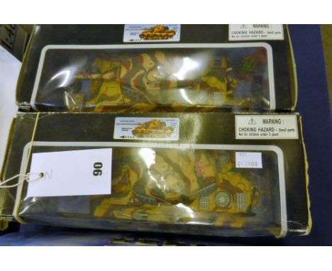 Two boxed WWII German battery operated King Tiger tank toys, both sets come with all the soldiers, scale 1:32.