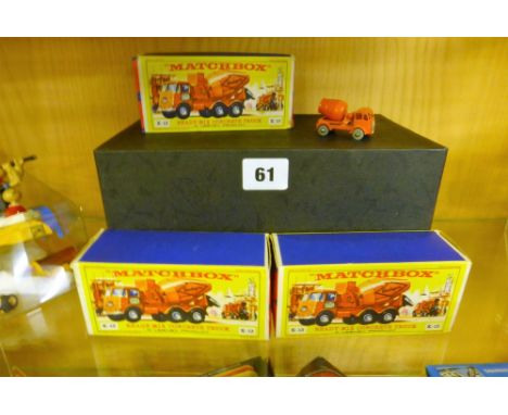 Three boxed Matchbox Lesney King size K-13 Ready-Mix concrete trucks, together with an unboxed smaller version c1963 - 1970.