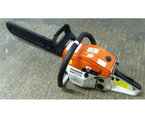An MT-9999 petrol chainsaw