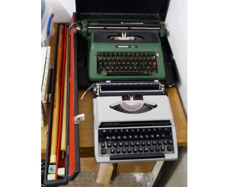 Two Silver Reed portable typewriters, together with a cased two-piece Pot-Black snooker cue and a cut glass table lamp.