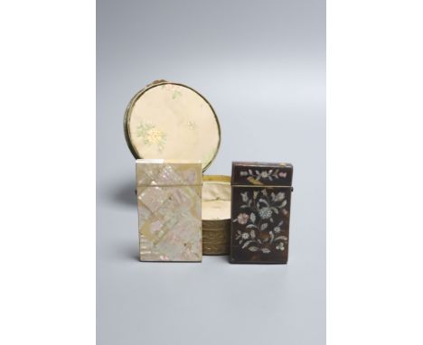 A Victorian tortoiseshell and mother of pearl card case, similar mother of pearl case and a porcelain mounted brass casket wi