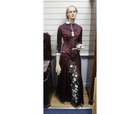 A 1950's full length shop mannequin and a similar together with a Victorian brown silk dress and embroidered coat cape plus c