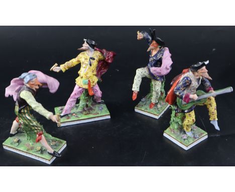 A set of four Continental porcelain Derby-style Comedia del Arte figures, largest 18.5cmCONDITION: - figure with blue shirt -