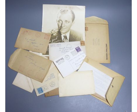 A collection of signed and facsimile signed photographs and photo cards from stars of Hollywood in the 1940's, all posted fro
