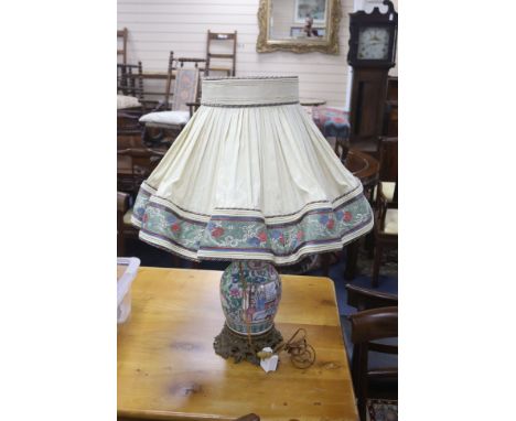 A late 19th century Cantonese famille rose baluster vase (lacking one handle), ormolu mounted and fitted as a table lamp, hei