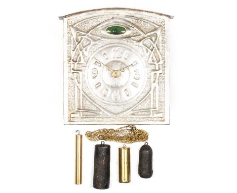 A SILVERED BRASS WALL CLOCK, IN THE MANNER OF MARGARET GILMOUR arched square form, embossed with a Celtic knotwork design and
