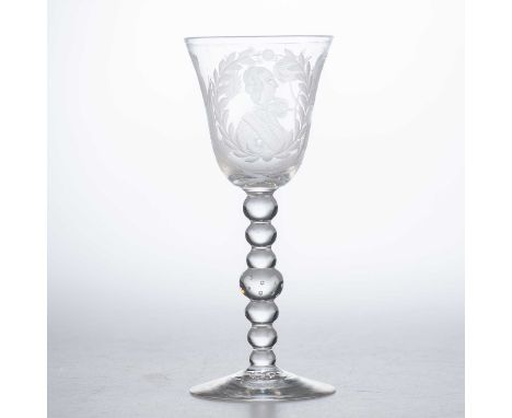 A DUTCH-ENGRAVED NEWCASTLE LIGHT BALUSTER WINE GLASS, MID-18TH CENTURY the goblet bowl engraved with a portrait bust of a gen