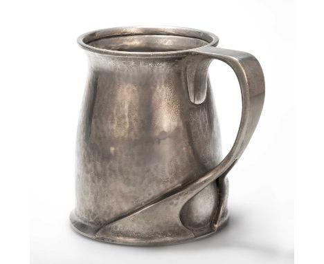 ARCHIBALD KNOX (1864-1933) FOR LIBERTY & CO, A TUDRIC PEWTER TANKARD no. 066, planished body with a flared rim and whiplash s