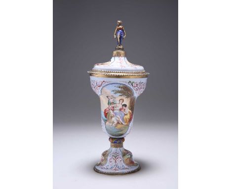 A FINE VIENNESE ENAMEL AND SILVER-GILT CUP AND COVER, BY HERMANN BOHM, CIRCA 1870 the lid with a finial of a scantily clad la