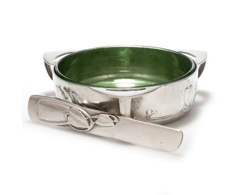 ARCHIBALD KNOX (1864-1933) FOR LIBERTY & CO, A TUDRIC PEWTER BUTTER DISH  no. 0162, circular with three lug handles, cast in 